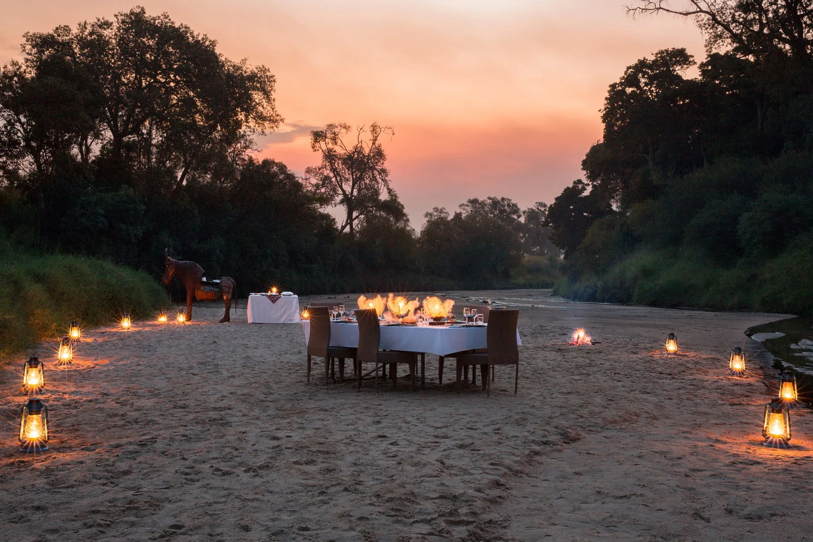 Bush dinner beside the Sand River at Sala’s Camp in the Maasai Mara