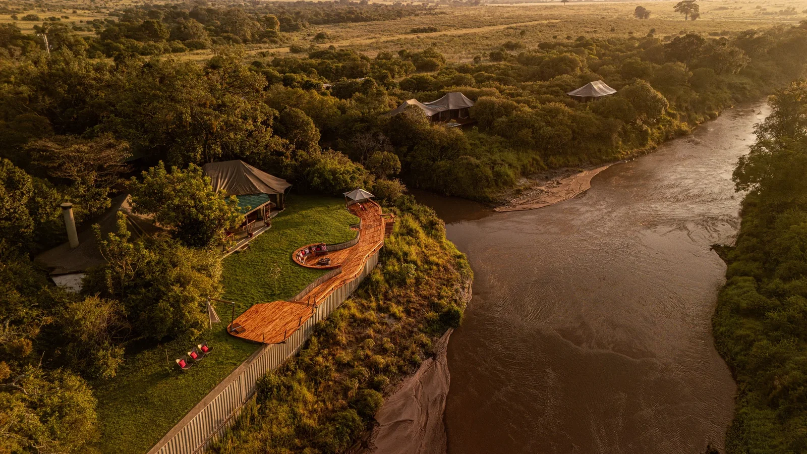 Aerial view of Sala's Camp overlooking the Sand River in Kenya's Maasai Mara