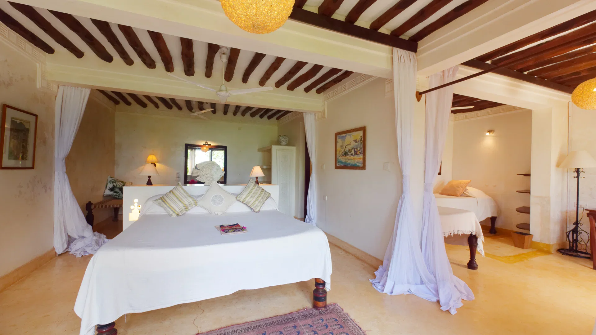 White-canopied bedroom at Peponi Hotel on Lamu Island