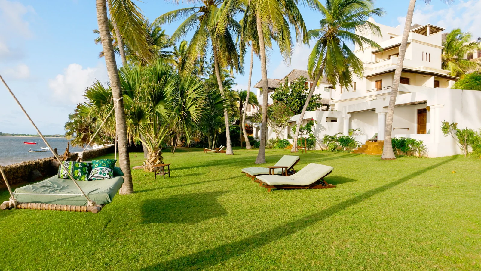 Tropical garden and oceanfront setting at Peponi Hotel in Lamu