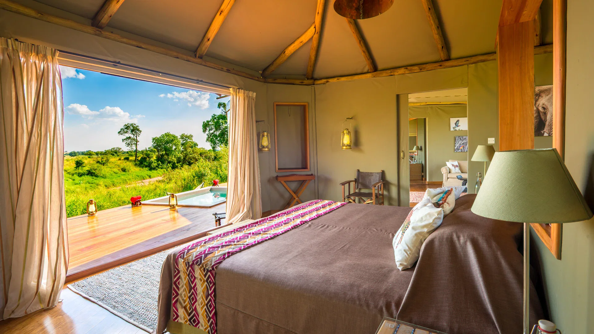 Bedroom inside the Keekorok Family Tent at Sala’s Camp, overlooking the Maasai Mara.