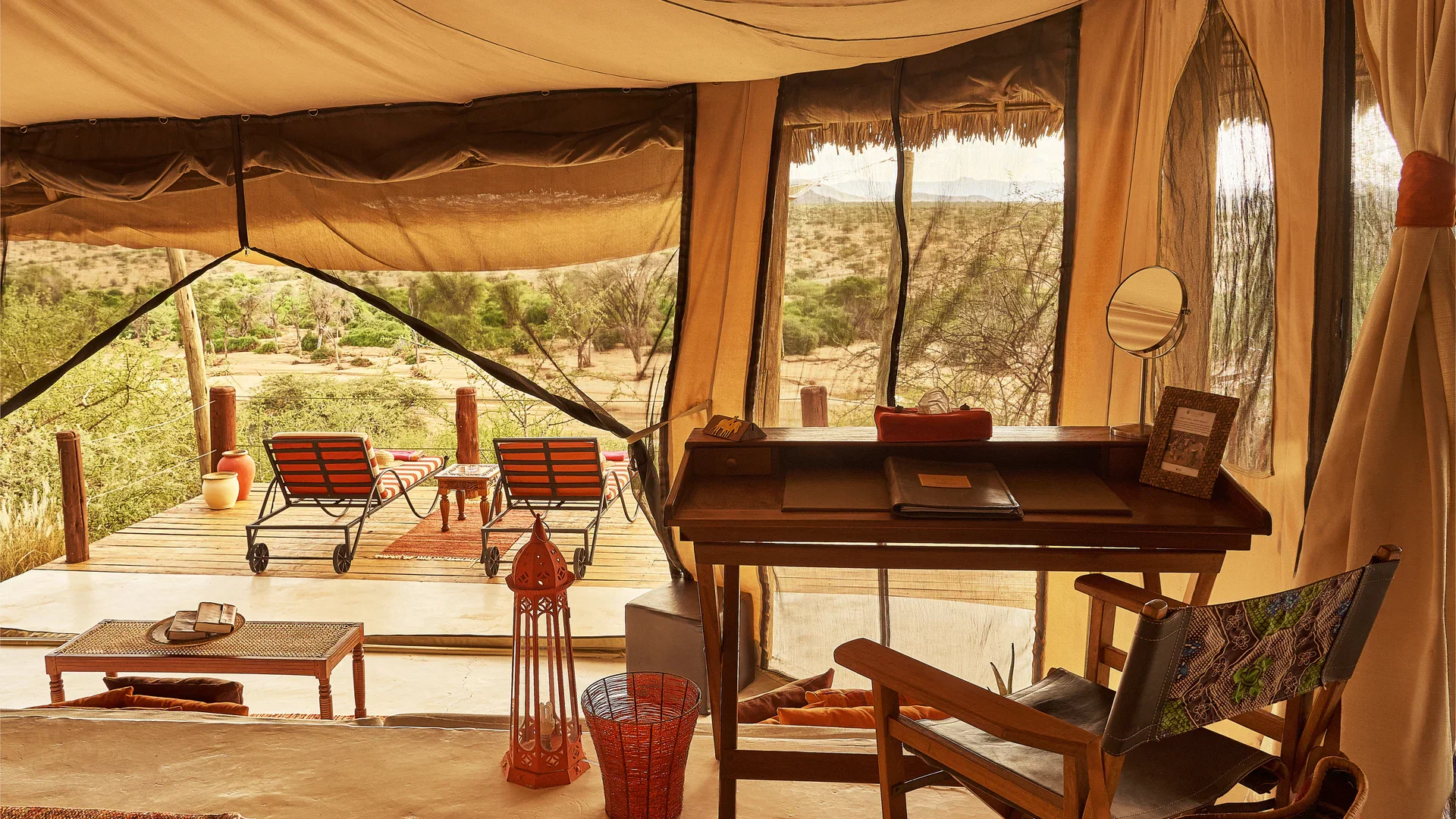 Open-sided tent interior at Sasaab overlooking the Samburu landscape