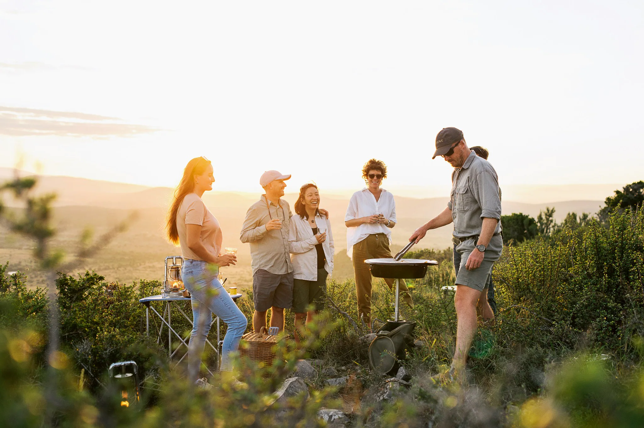Safari sundowners beneath the open sky at Kwandwe Private Game Reserve