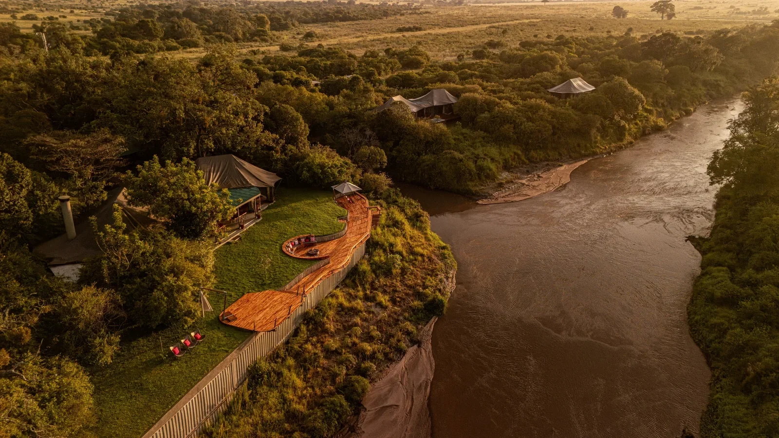 Aerial view of Sala's Camp overlooking the Sand River in Kenya's Maasai Mara