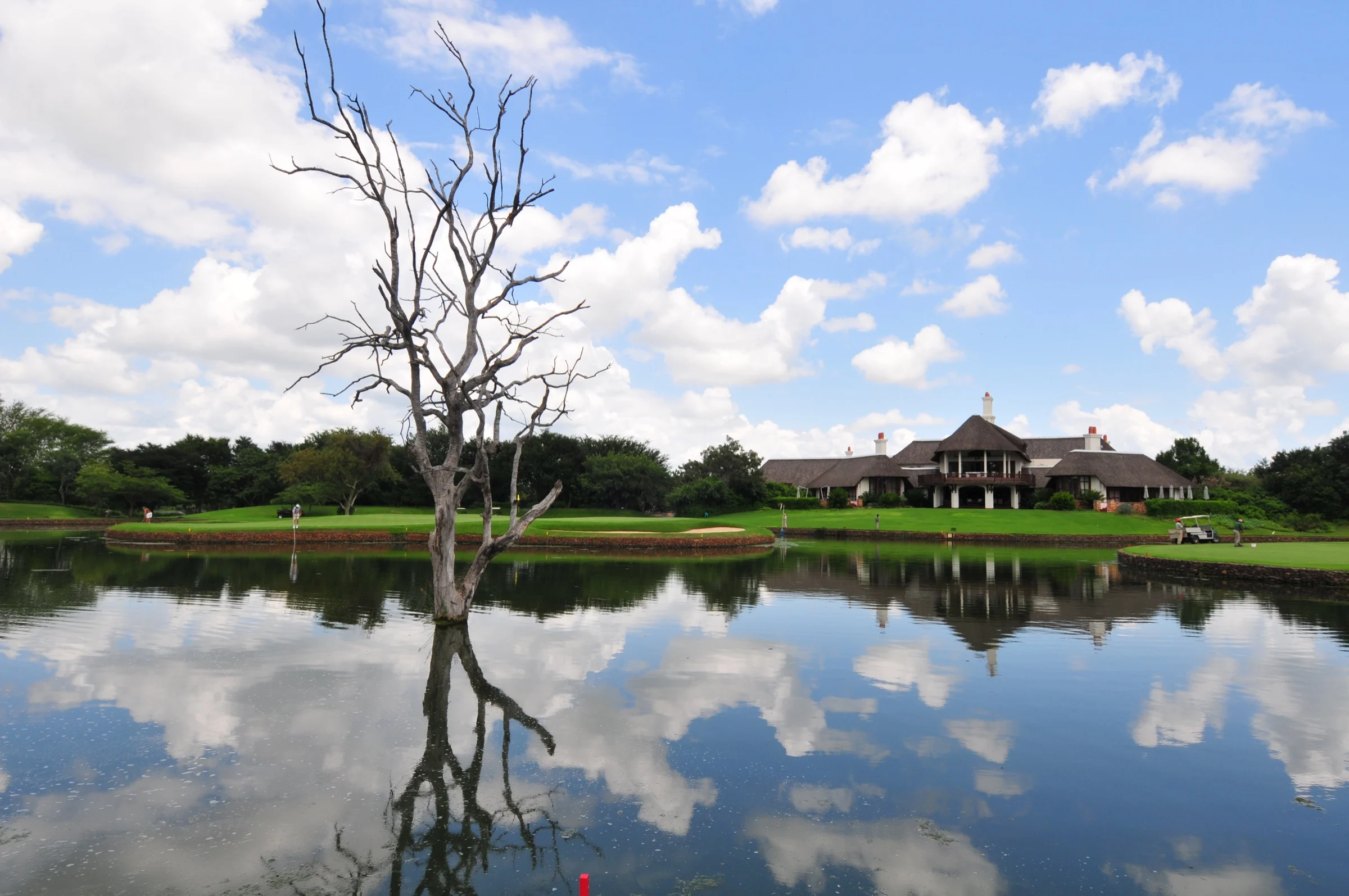 Lake and clubhouse at Leopard Creek Country Club