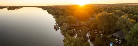 Mukwa River Lodge beside the Zambezi at sunset